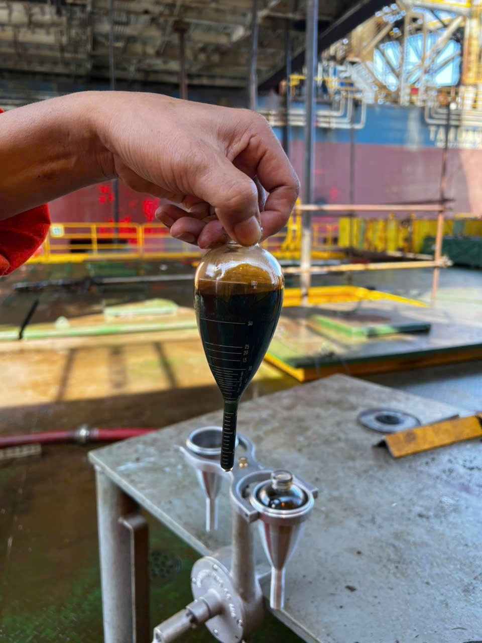 Sample of crude oil from the first flow entering the WHP-KTN processing system.